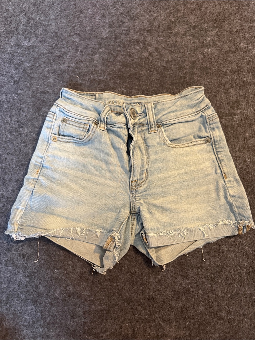 American Eagle Outfitters light wash denim cutoff shorts